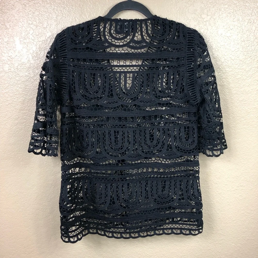 Goldie crocheted lace v neck flare sleeve top.